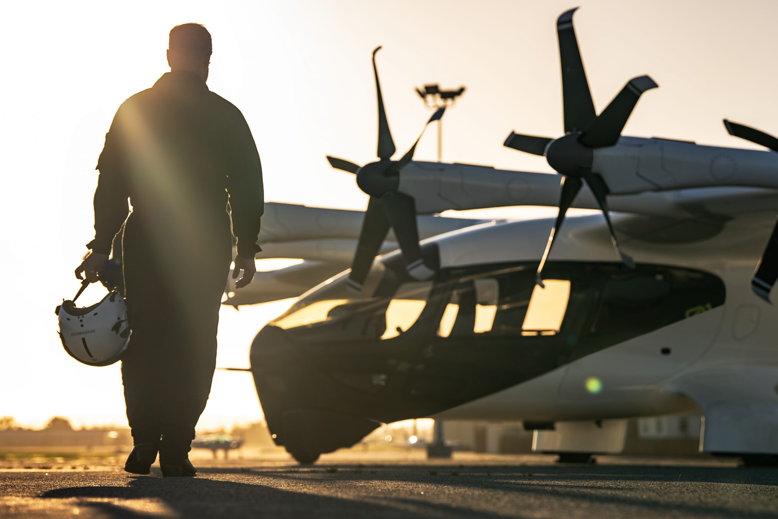 Test pilot walks out to Archer Aviation Midnight eVTOL aircraft.