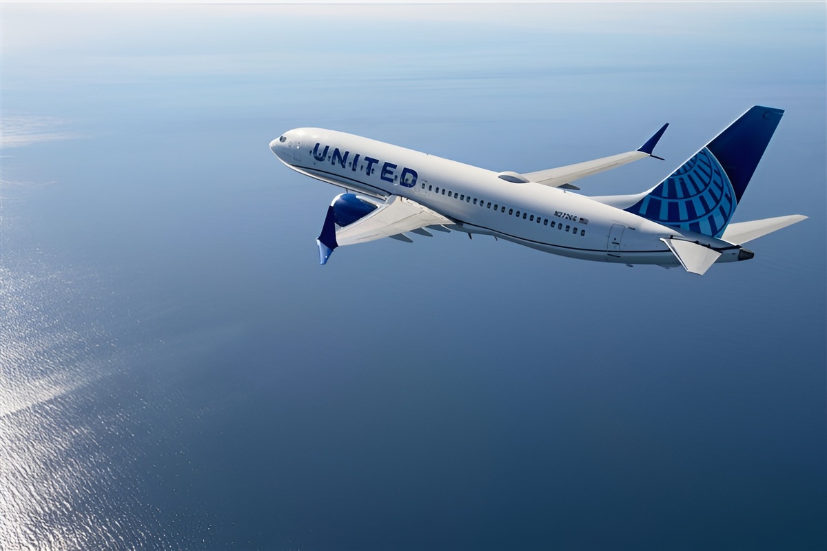 A United Airlines 737 MAX in flight over ocean